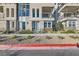 Modern building exterior with light-colored facade and landscaping at 10005 Hematite Pl # 3, Las Vegas, NV 89143