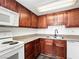 Modern kitchen with stainless steel appliances, ample storage, and wood cabinetry at 4421 Alexis Dr # 429, Las Vegas, NV 89103