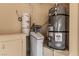 Garage area with water softener and water heater at 9621 Verlaine Ct, Las Vegas, NV 89145