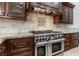 Granite countertops and stainless steel appliances highlight this beautiful kitchen at 9621 Verlaine Ct, Las Vegas, NV 89145