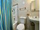 Simple bathroom with a shower/tub, toilet, and sink at 17699 E Clark Dr, Crystal, NV 89060