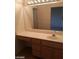 Bright bathroom with vanity, large mirror, and light fixtures at 10404 Frostburg Ln, Las Vegas, NV 89134