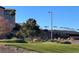 Partial view of a resort style pool with umbrellas at 1858 June Lake Dr, Henderson, NV 89052