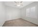 Bedroom with ceiling fan and window shutters at 2686 Kinghorn Pl, Henderson, NV 89044