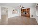 Living area with built-in shelving and tile flooring at 2686 Kinghorn Pl, Henderson, NV 89044