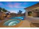 Evening view of a refreshing pool and spa at 2686 Kinghorn Pl, Henderson, NV 89044