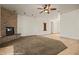 Living room with cozy fireplace and neutral color scheme at 653 Paloma Cir, Mesquite, NV 89027