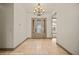 Bright entryway with tile flooring and elegant chandelier at 653 Paloma Cir, Mesquite, NV 89027