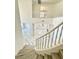 Two story entryway with curved staircase and marble floors at 6745 Keren Marie Ave, Las Vegas, NV 89110