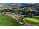 Aerial view of a beautiful community nestled against a mountain backdrop at 1492 Macdonald Ranch Dr, Henderson, NV 89012