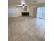 Living area with fireplace and tile floors at 3923 Via Lucia Dr, Las Vegas, NV 89115