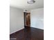 Spacious living room with hardwood floors and access to kitchen at 3013 Piedmont Ave, Las Vegas, NV 89102