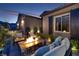 Outdoor patio with firepit and seating area, perfect for relaxing evenings at 33 Desert Juniper Ln, Henderson, NV 89011