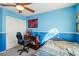 Bedroom with twin bed, desk and gaming chair at 6046 Notre Dame Ave, Las Vegas, NV 89110