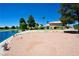 Backyard with pond, trees, and home view at 4901 Portraits Pl, Las Vegas, NV 89149