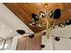 Modern gold and black chandelier in the entryway at 1376 Opal Valley St, Henderson, NV 89052