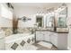 Elegant bathroom with corner tub, double vanity, and updated fixtures at 1095 Endora Way, Boulder City, NV 89005