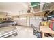 Two-car garage with overhead storage and workbench at 1095 Endora Way, Boulder City, NV 89005