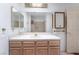 Bathroom with vanity, large mirror, and tub shower combo at 2851 S Valley View Blvd # 2148, Las Vegas, NV 89102