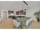 Bright dining room featuring a large table and modern chandelier at 5714 Golden Chase Ct, Las Vegas, NV 89131