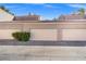 Attached garage with three garage doors in a row at 5250 S Rainbow Blvd # 2136, Las Vegas, NV 89118