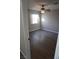 Spacious bedroom featuring wood-look floors and ceiling fan at 5524 Big Sky Ln, Las Vegas, NV 89149