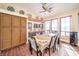 Kitchen dining area with a table for six and large windows at 1056 Calico Ridge Dr, Henderson, NV 89011