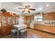 Kitchen with oak cabinets and a wood-look tile floor at 208 Prince Ln, Las Vegas, NV 89110