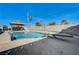 Stunning pool with diving board and adjacent patio with gazebo at 208 Prince Ln, Las Vegas, NV 89110