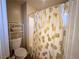 Clean bathroom with toilet, bathtub, and shower at 6824 Mesita Ave, Las Vegas, NV 89122