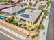 House with solar panels, pool, and playground visible from above at 9611 Bruschi Ridge Ct, Las Vegas, NV 89149