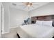 Bedroom with king-size bed and ceiling fan at 9611 Bruschi Ridge Ct, Las Vegas, NV 89149