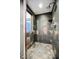 Clean shower with dark tile and single shower head at 11441 Allerton Park Dr # 214, Las Vegas, NV 89135