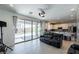 Living area with sliding glass doors leading to the backyard at 6442 Kobe Knoll Ct, Las Vegas, NV 89141