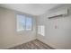 Bright bedroom with wood-look floors and window blinds at 1708 Cedar Ave, Las Vegas, NV 89101