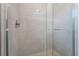 Clean shower with light gray tile surround at 477 Highview Ridge Ave, Las Vegas, NV 89138