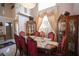 Formal dining room with a large table and ornate chairs at 4381 Flagship Ct, Las Vegas, NV 89121