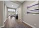 Bright entryway with hardwood floors, leading to the living room at 10 Via Tiberina, Henderson, NV 89011