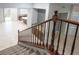 View of the home's interior, showing the staircase and kitchen at 9630 Desert Daisy Ct, Las Vegas, NV 89178