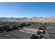 Single-story home with solar panels and mountain views at 10972 Chipotle Ave, Las Vegas, NV 89166