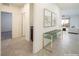 Hallway with tiled floor, console table, and access to other rooms at 10972 Chipotle Ave, Las Vegas, NV 89166