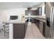 Modern kitchen with stainless steel appliances and granite countertops at 10972 Chipotle Ave, Las Vegas, NV 89166