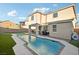 Two-story home with a refreshing rectangular pool in the backyard at 969 Cutter St, Henderson, NV 89011