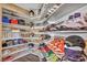 Large closet with shelving for shoes and clothing at 1111 N Christy Ln, Las Vegas, NV 89110