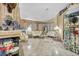 Living room with ornate furniture, a fireplace, and decorative collectibles at 1111 N Christy Ln, Las Vegas, NV 89110