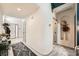 Bright and spacious entryway with tile flooring and coat rack at 2133 Desert Pines St, Las Vegas, NV 89134