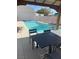 Relaxing poolside patio with gazebo and outdoor dining area at 343 Fife St, Henderson, NV 89015