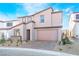 Two-story house with modern facade and attached garage at 9405 Ara Pl, Las Vegas, NV 89143