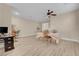 Spacious dining area featuring hardwood floors and a ceiling fan at 11074 Caramel Crest Ct, Las Vegas, NV 89135