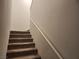 Carpeted staircase leading to the upper level of the home at 12369 Golden Wreath Rd # 2, Las Vegas, NV 89183